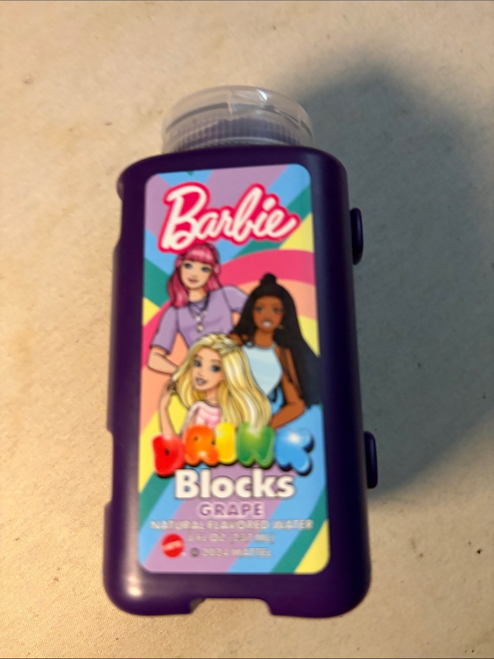 Vintage Collectible Barbie Purple  with Rainbow Character Natural Flavored Water